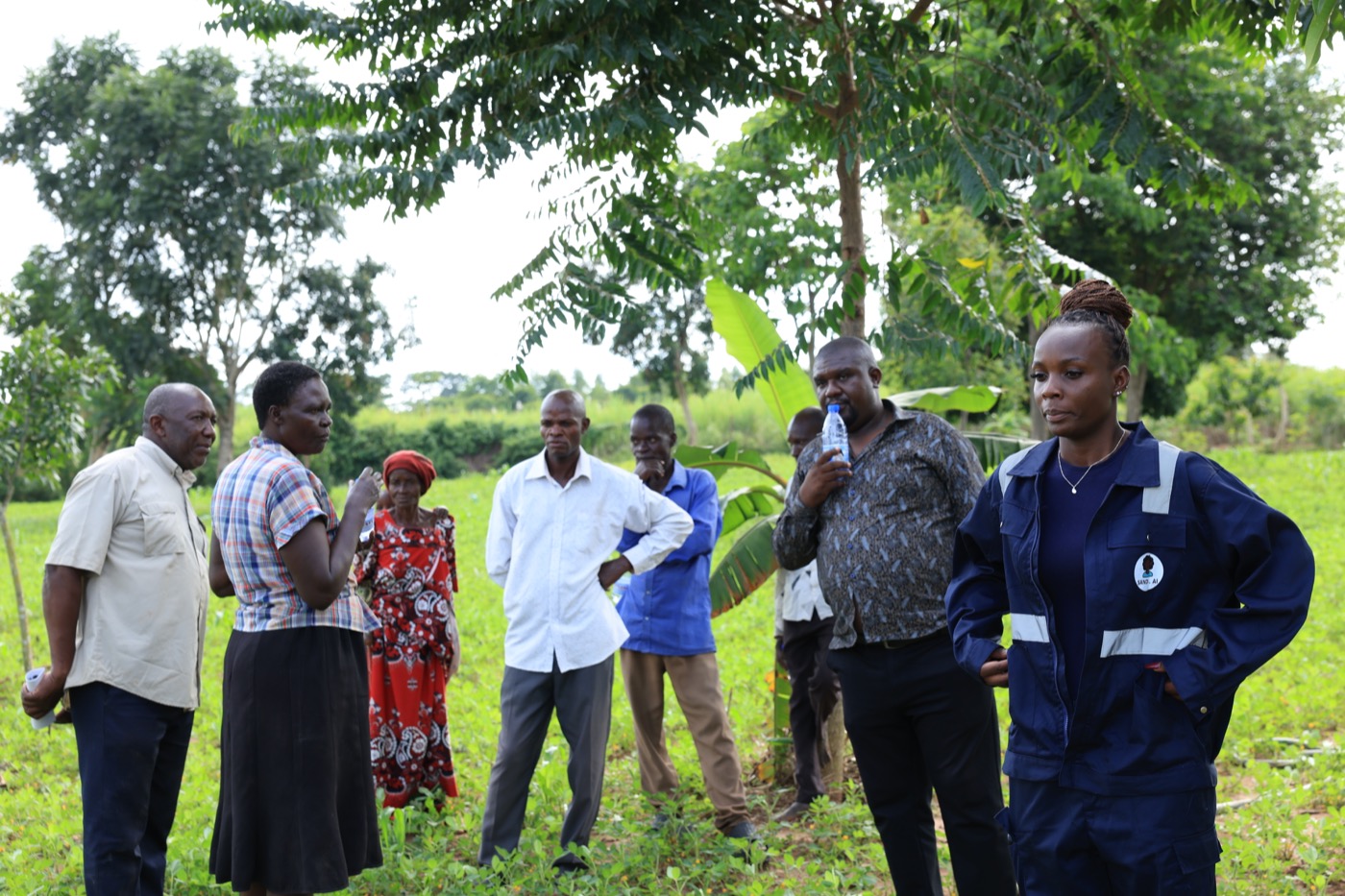 Farmers setting up a Sandi AI solar irrigation kit
